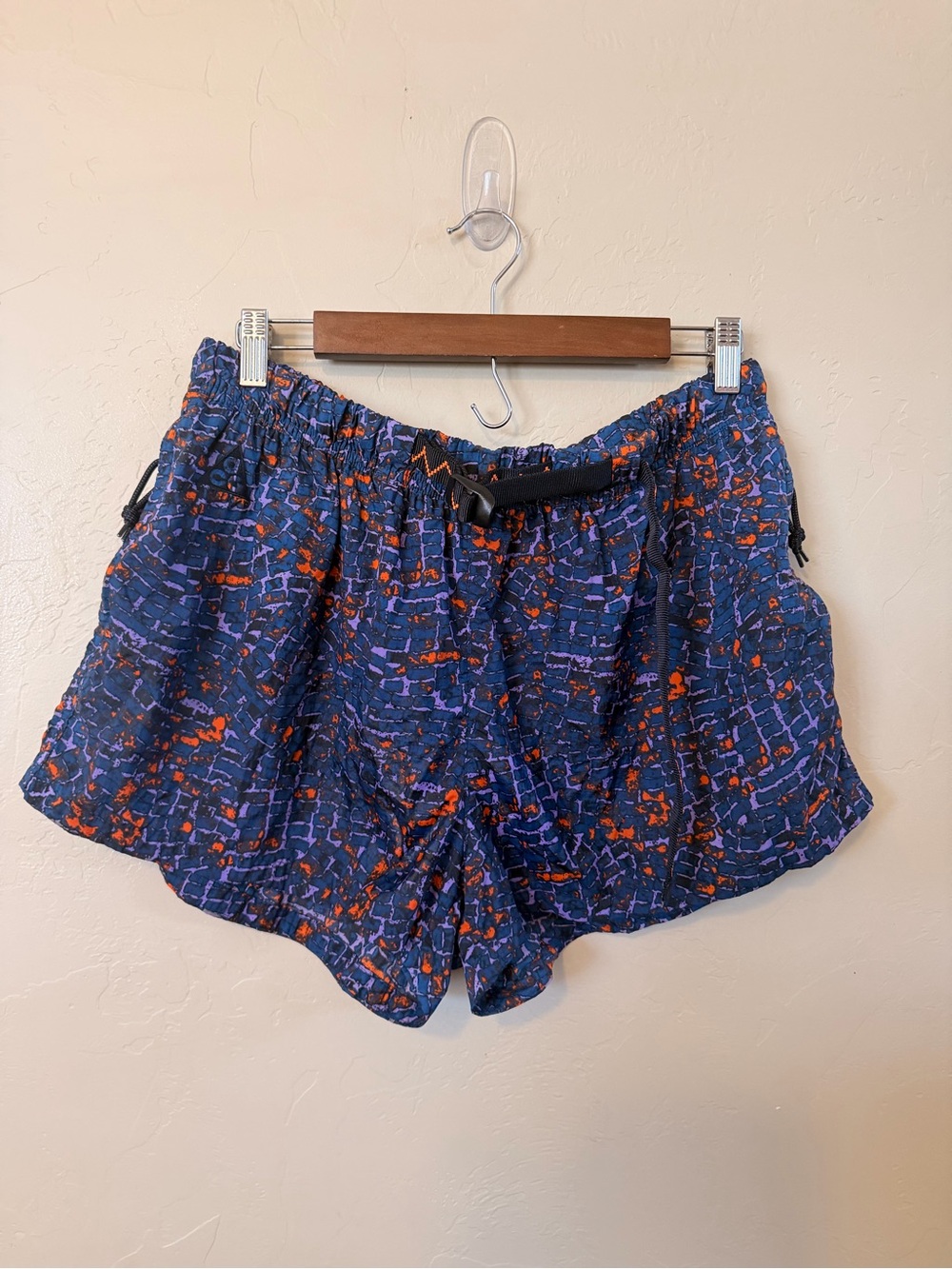 Nike Women's Navy and Orange Abstract Print Athletic Shorts